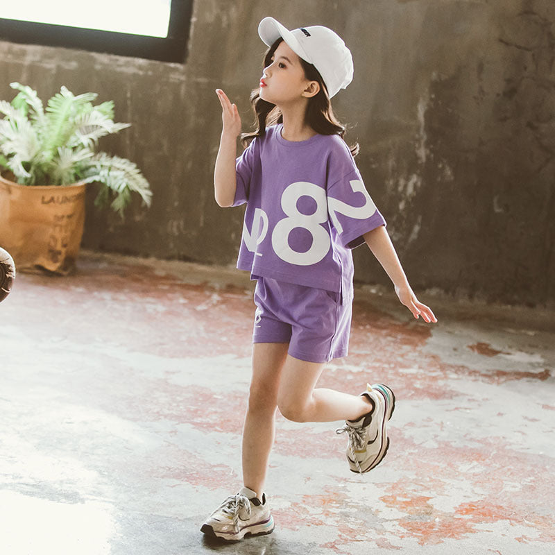 Girls Loose-Fit Short Sleeve Sports Set – Comfy two-piece outfit for active kids. Save 30% today!